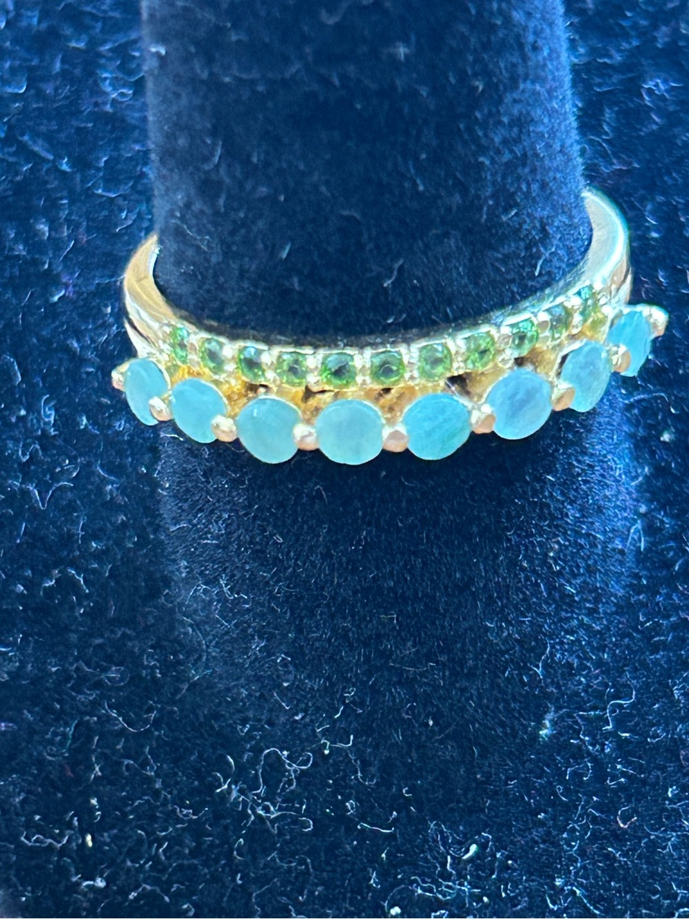 Genuine emerald and chrome diopside. 24 kt gold over sterling silver band.